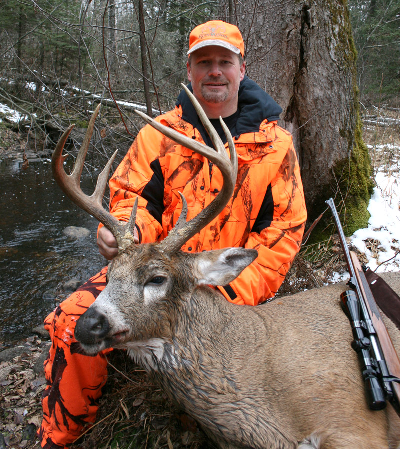 Doc's son Ken with his latest trophy buck. (2012, 8-pointer)